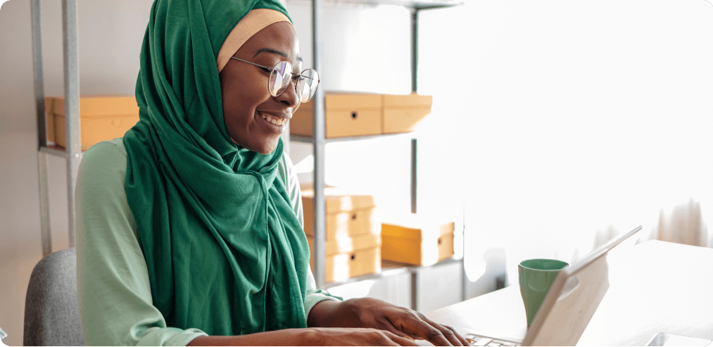 Woman looking at laptop
